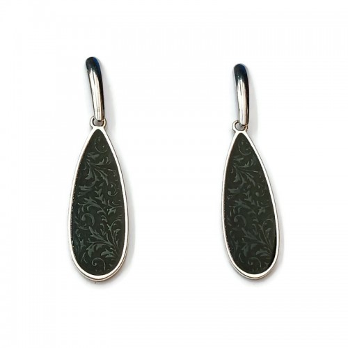 Σκουλαρίκια με επαργυρα μάτια με μαύρο σμάλτο και ατσάλινα καρφάκια